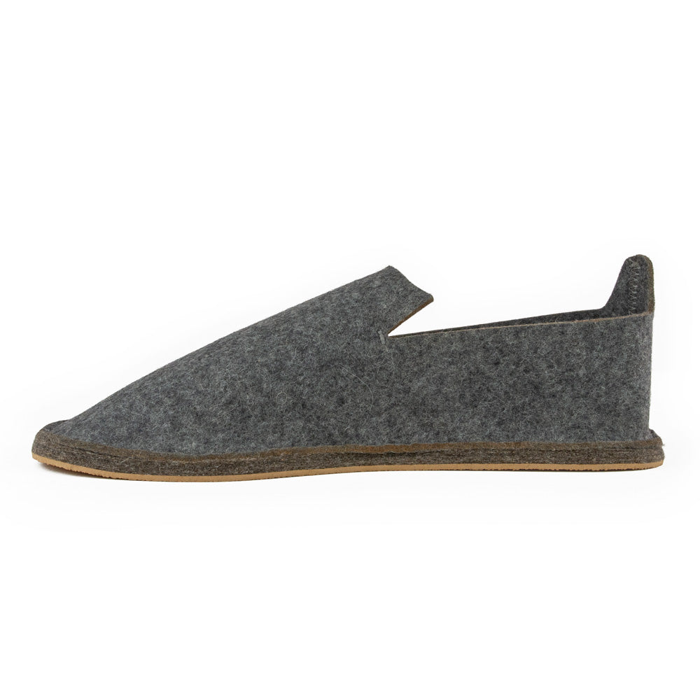 Side view of a slip on wool slipper on a white background — Durable and long lasting — Unisex gift idea