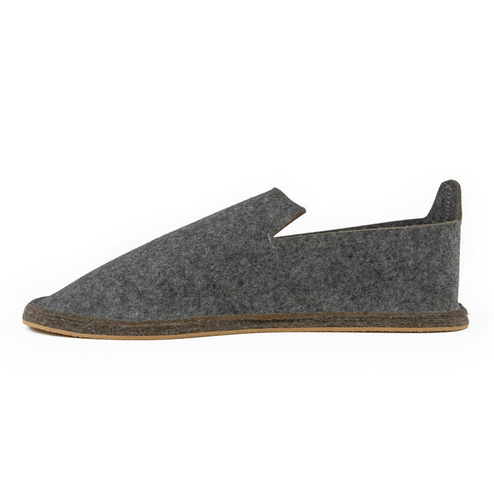 Side view of a slip on wool slipper on a white background — Durable and long lasting — Unisex gift idea